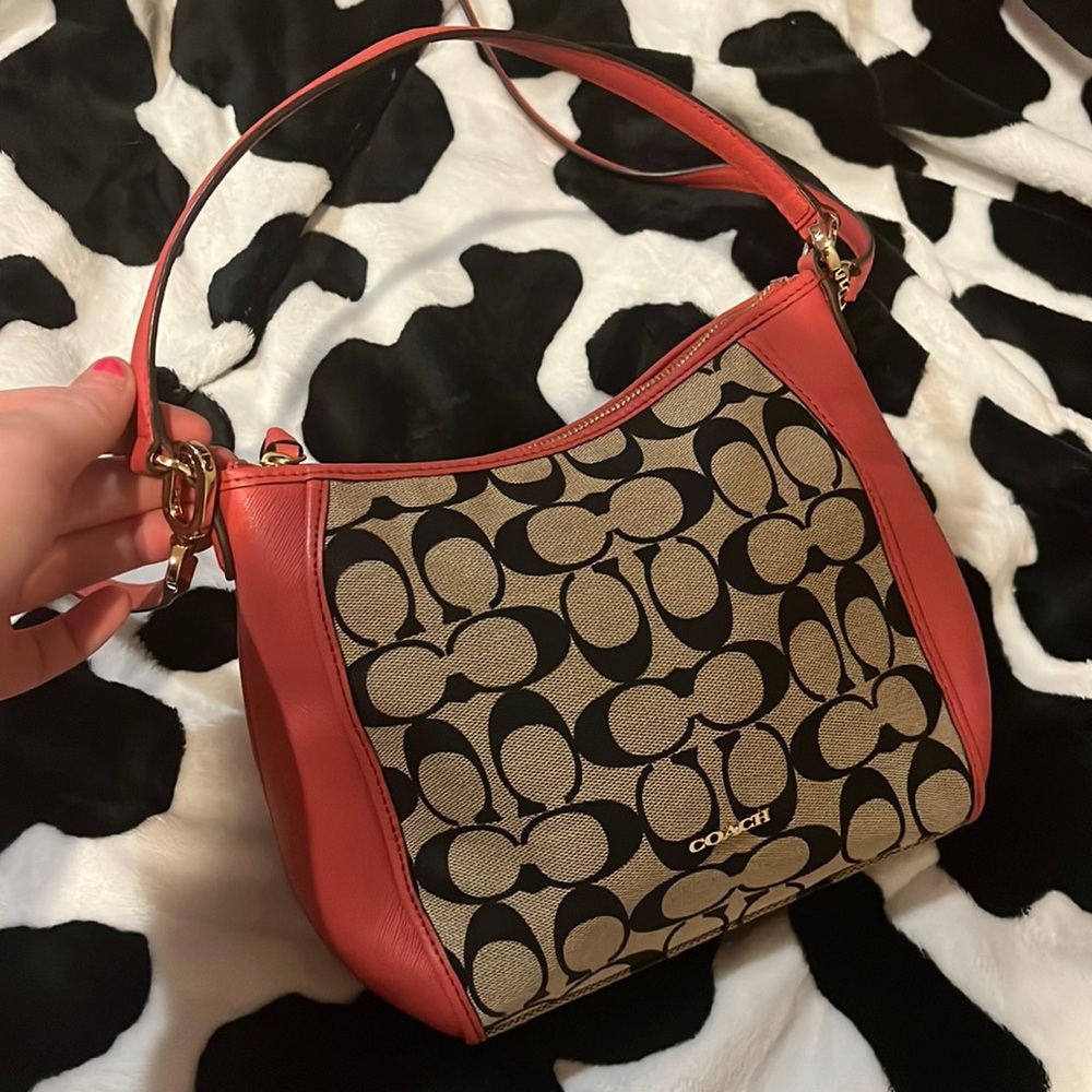 Pink Coach Jes signature crossbody bag